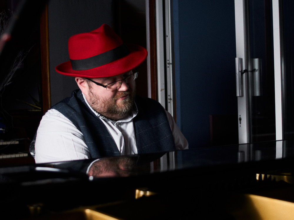Chris Lydon at the piano